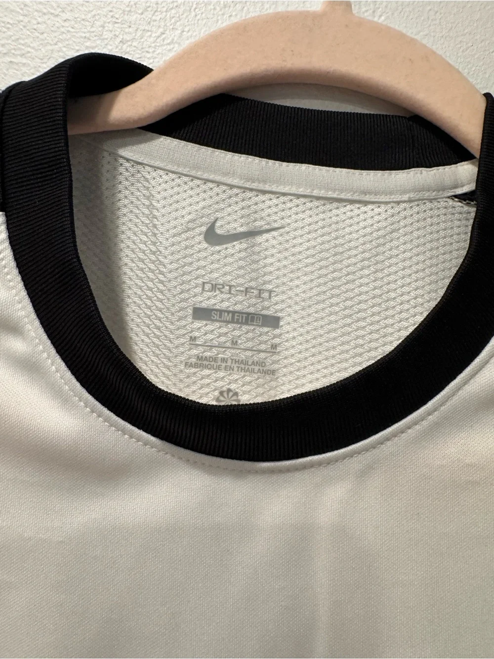 Nike Men’s White Short-Sleeve Training Shirt with Black Trim and Red Swoosh